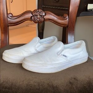 Kids white slip on vans.